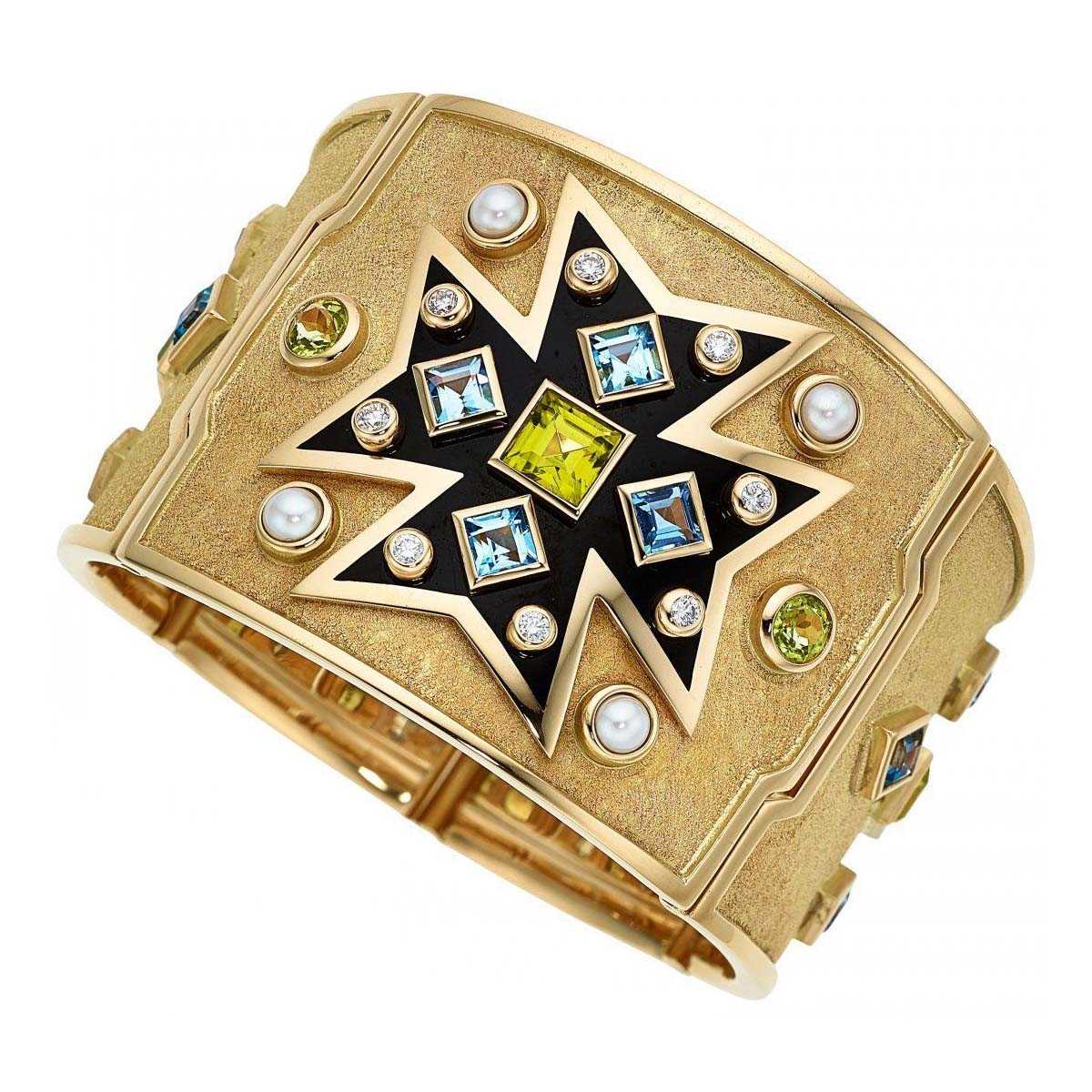 Verdura’s most famed jewelry design might be the Maltese Cross cuff. A gold example with black enamel, cultured pearls, blue topaz, peridot, and full-cut diamonds of G-H-I color and VS clarity achieved $22,000 plus the buyer’s premium in December 2018. Image courtesy of Heritage Auctions and LiveAuctioneers.