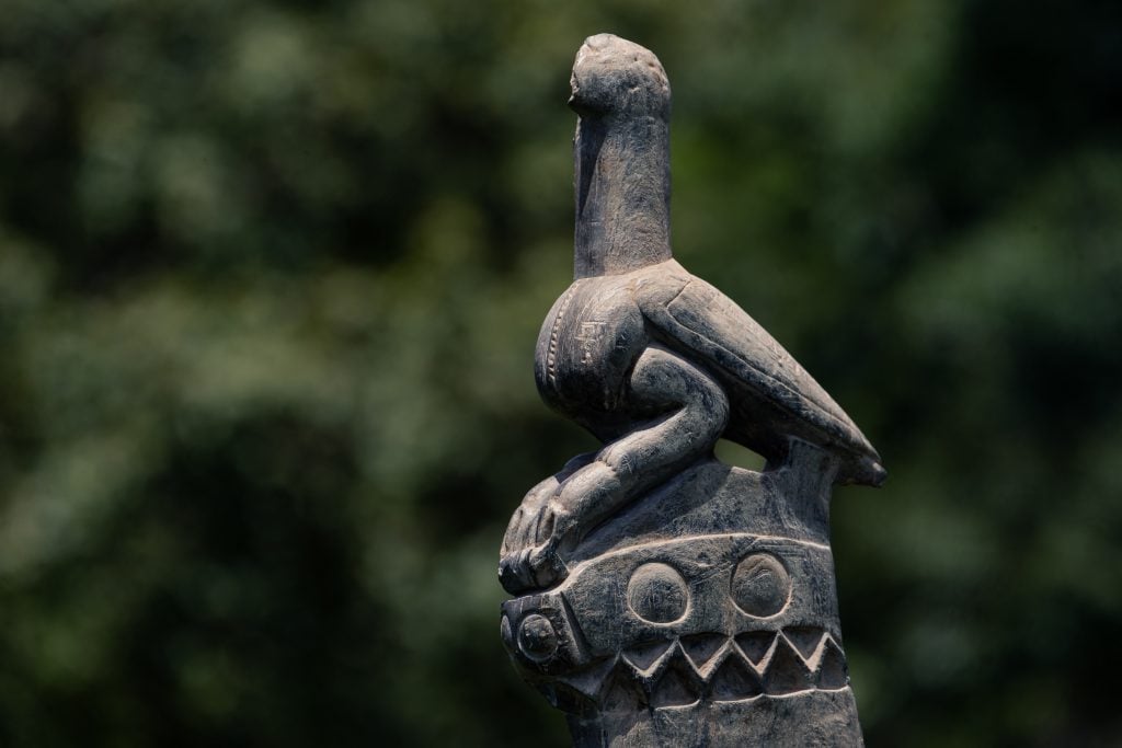 An ancient African sculpture of a bird carved from soapstone